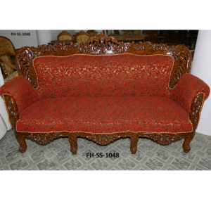Hand-carved royal wooden sofa set with crimson red upholstery and intricate traditional detailing