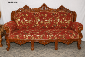 Hand-carved royal wooden sofa set with floral-pattern upholstery and classic heritage design
