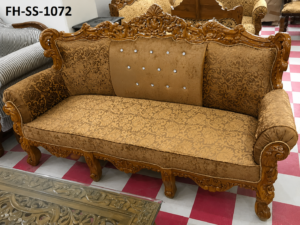 Luxury carved wooden sofa set with crystal-button tufted backrest, premium brown upholstery, handcrafted detailing, and royal classic design.
