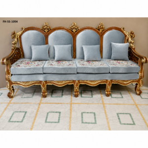 Luxury carved wooden sofa set featuring a grand crown-style backrest, premium grey velvet upholstery, gold-finished detailing, decorative embroidery, and elegant handcrafted craftsmanship.