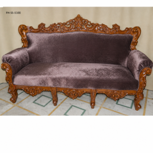 Elegant handcrafted wooden sofa set featuring luxurious dark velvet upholstery, ornate floral carvings, rolled armrests, and a royal classic design.