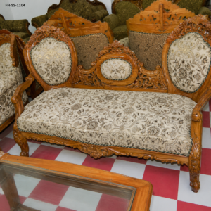 Handcrafted wooden sofa set featuring elegant floral upholstery, detailed traditional carvings, premium solid wood construction, and a timeless royal design.