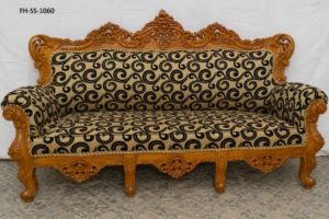 Hand-carved wooden sofa set with elegant floral upholstery, premium craftsmanship, and classic royal-inspired design.