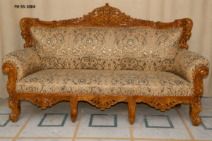 Luxury hand-carved wooden sofa set with elegant green floral upholstery and traditional royal craftsmanship.