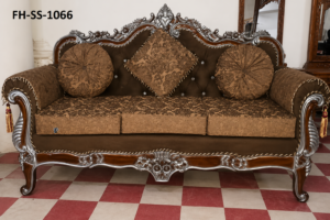 Luxury carved wooden sofa set with silver accents, premium brown upholstery, tufted backrest, and royal classic design.