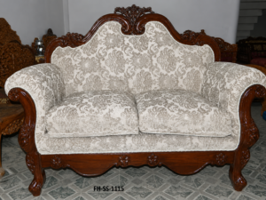 Elegant handcrafted wooden loveseat featuring a rich dark wood frame, ornate carvings, rolled arms, and luxurious cream damask-pattern upholstery.