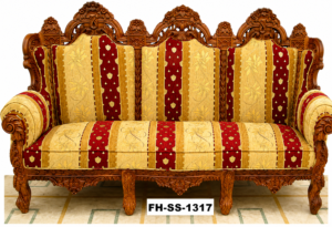 Luxury handcrafted solid wood sofa featuring intricate floral carvings, high backrest, rolled armrests, and premium striped upholstered fabric in red and gold tones.