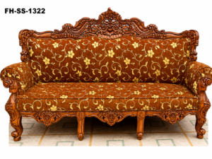 Luxury handcrafted solid wood sofa with intricate floral carvings, premium brown floral upholstery, rolled armrests, and an elegant high-back design.