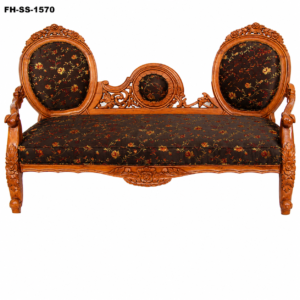Elegant handcrafted solid wood chaise lounge with intricate floral carvings, premium dark floral upholstery, decorative center medallion, and luxurious antique finish.