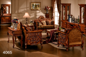 Luxurious handcrafted living room sofa set featuring richly carved solid wood frames, premium patterned upholstery, elegant accent cushions, and classic traditional styling in a sophisticated home interior.