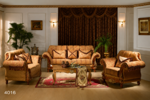 Elegant classic wooden living room sofa set with carved solid wood frame, premium patterned upholstery, rolled armrests, plush cushions, and a traditional luxury design in a sophisticated home setting.