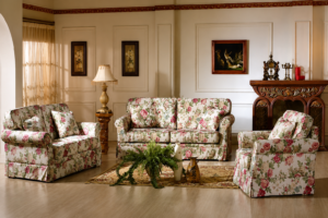 Elegant floral fabric living room sofa set featuring soft floral upholstery, plush cushions, rolled armrests, and a cozy cottage-inspired design perfect for classic and farmhouse interiors.