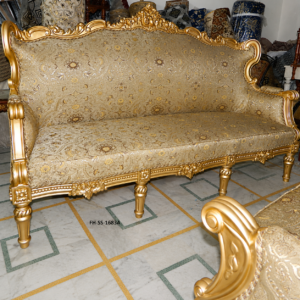 A luxurious handcrafted royal sofa featuring an intricately carved solid wood frame with an elegant antique gold finish and premium floral jacquard upholstery. Designed with timeless European-inspired styling, this statement sofa adds sophistication and comfort to luxury homes, hotels, villas, and palace-inspired interiors.