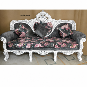 A beautifully handcrafted luxury sofa featuring a white hand-carved solid wood frame paired with elegant grey floral velvet upholstery. The sophisticated floral pattern, curved armrests, and ornate carvings create a timeless statement piece perfect for luxury living spaces, hotels, villas, and classic interiors.