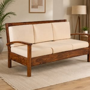 A contemporary solid wood sofa featuring a natural wood finish, clean straight lines, gently curved armrests, and plush cream upholstered cushions. Designed with a minimalist aesthetic, this sofa blends modern comfort with timeless wooden craftsmanship, making it perfect for homes, offices, lounges, and hospitality spaces.