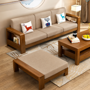 A beautifully designed Modern Premium Solid Wood Sofa Set featuring a rich natural wood finish, plush beige fabric upholstery, and a sleek contemporary silhouette. The set includes a spacious three-seater sofa, a matching coffee table, and a comfortable ottoman, creating a perfect blend of elegance, comfort, and functionality for modern homes, apartments, offices, and hospitality spaces.