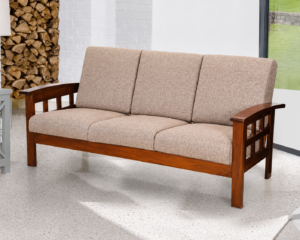 A stylish Modern Solid Wood 3 Seater Sofa featuring a premium solid wood frame with elegant side panel detailing and soft beige fabric upholstery. Designed with clean lines, spacious seating, and a sturdy wooden structure, this sofa offers the perfect balance of comfort, durability, and contemporary elegance for living rooms, apartments, offices, lounges, and reception areas.