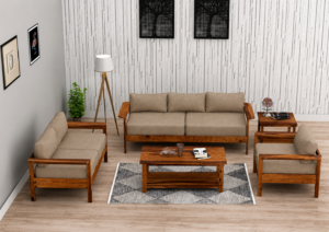 A stylish Modern Solid Wood Living Room Sofa Set featuring a premium solid wood frame with soft beige upholstered cushions. This elegant seating set includes a spacious 3-seater sofa, two comfortable single-seater chairs, a matching center table, and a side table, making it a complete solution for contemporary living spaces. Its clean lines, rich wooden finish, and minimalist design offer the perfect balance of comfort and sophistication.