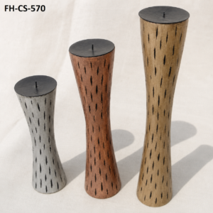 A beautifully handcrafted Wooden Candle Stand Set featuring three elegant pedestal candle holders in varying heights. Crafted from premium solid wood with a smooth natural finish, each stand showcases a graceful hourglass silhouette and decorative inlay detailing. Designed to hold pillar candles, these candle stands add warmth, sophistication, and timeless charm to living rooms, dining tables, entryways, hotels, weddings, and festive décor.