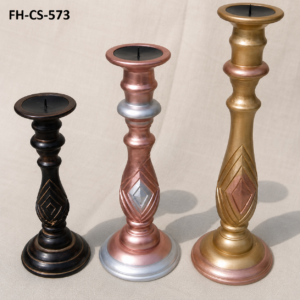 A premium Luxury Decorative Metal Candle Stand Set featuring three elegantly crafted candle holders in different heights with stunning antique finishes. Designed with intricate geometric embossed detailing and a graceful pedestal silhouette, this decorative set brings timeless elegance to living rooms, dining tables, hotels, weddings, restaurants, festive celebrations, and luxury interiors.