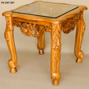 A beautifully crafted Handcrafted Wooden Carved Glass Top Console Table featuring a premium natural wood finish, elegant curved legs, detailed floral carvings, and a transparent glass tabletop. This classic design adds a luxurious and traditional charm to any interior space.