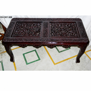 A luxurious Handcrafted Antique Wooden Carved Coffee Table featuring a deep polished wood finish, intricate floral carvings on the tabletop, detailed border work, and elegant curved legs. This traditional masterpiece adds a royal and vintage appeal to any living space.