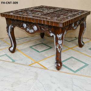 A premium Handcrafted Antique Wooden Carved Coffee Table featuring a rich dark wood polish, detailed floral carvings, decorative tabletop patterns, and beautifully curved legs. This elegant traditional design adds a royal and vintage touch to modern as well as classic interiors.