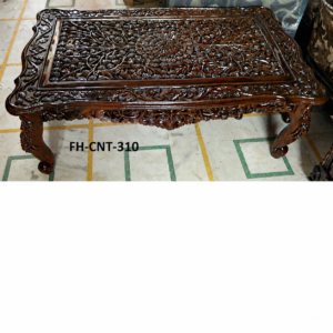 A luxurious Handcrafted Antique Floral Carved Wooden Coffee Table featuring an intricate carved tabletop, detailed floral patterns, rich dark wood polish, and elegant curved legs. This traditional masterpiece reflects premium craftsmanship and adds a royal vintage charm to any interior.