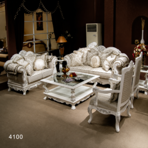 Elegant white carved solid wood sofa set with premium upholstered seating, matching coffee table, accent chairs, and luxurious classic living room design.