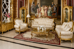 Luxury royal white and gold carved wooden sofa set with premium upholstery, ornate coffee table, and classic palace-style living room furniture.