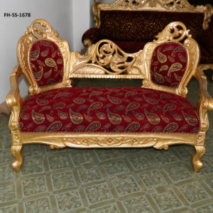 A luxurious handcrafted three-seater sofa featuring an intricately carved solid wood frame with an antique gold finish, elegant silver-grey floral upholstery, and classic European-inspired detailing. Designed to add sophistication and timeless beauty to luxury homes, hotels, villas, and premium lounge spaces.